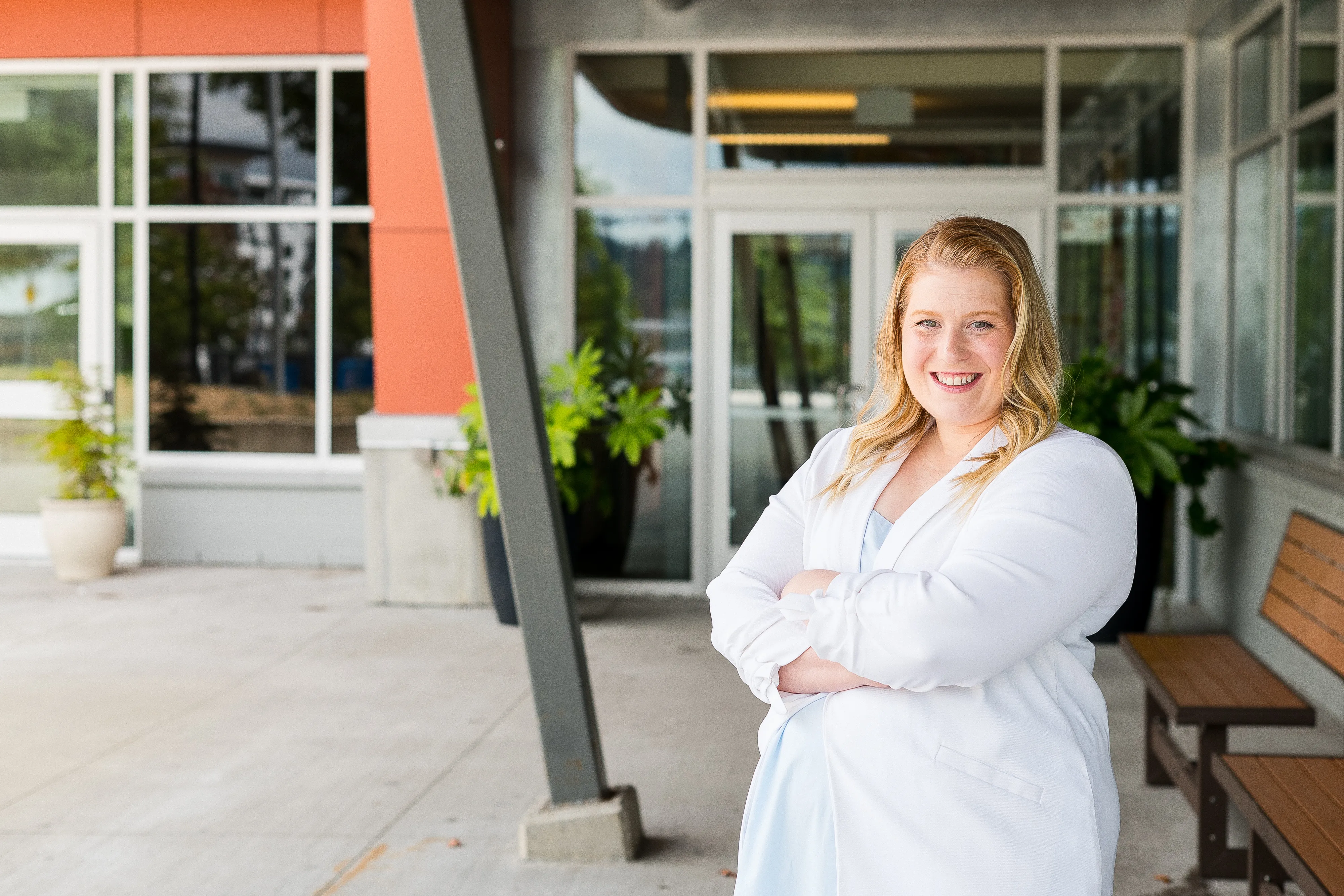 Jessica Morrison standing outside a Port Moody school building.